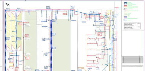Architectural floor plan with detailed layout showing rooms, measurements, and utility systems in blue and red lines